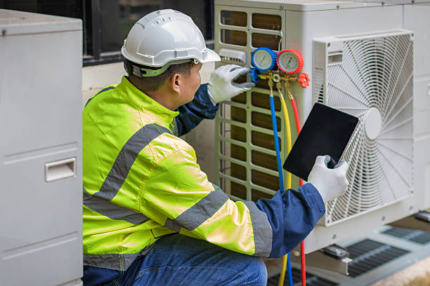 Professional Air Conditioning Repair technician working in Milan, MI